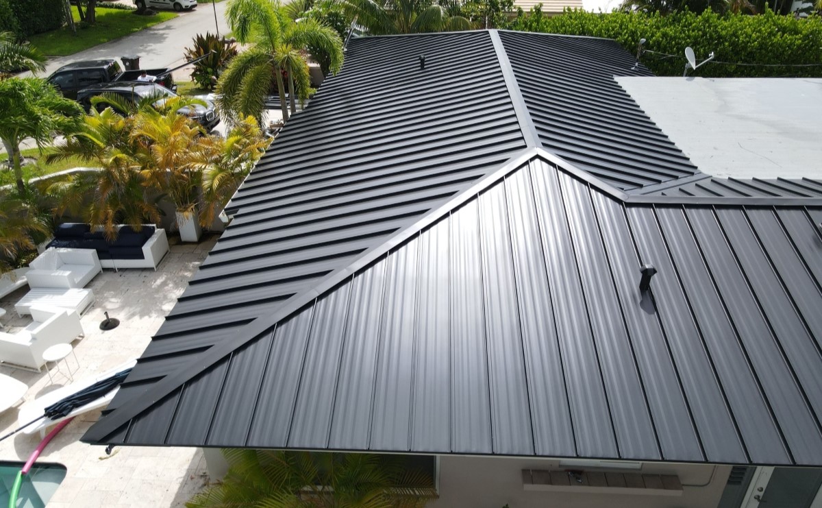 Metal & Flat Re-Roof in Fort Lauderdale Florida. Professional Roofing Projects by MIW Roofing & Windows