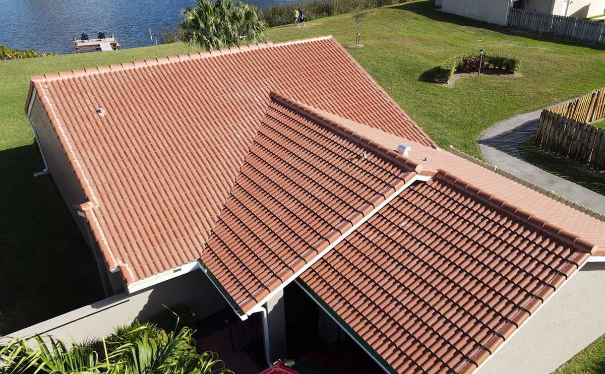 Successful barrel tile reroof in Delray Beach Florida. We used Boral product Estate Terra Cota concrete tile roof materials.